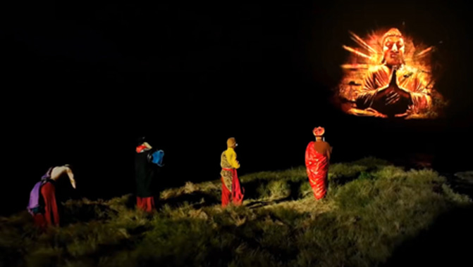 Vivid Buddha image projected onto cliff-face with a Christie Griffyn 4K50-RGB projector