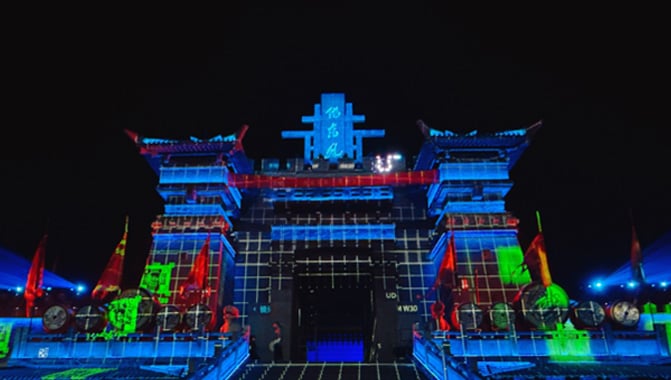 Jianye Display’s team performing projection calibration on the façade of the citadel